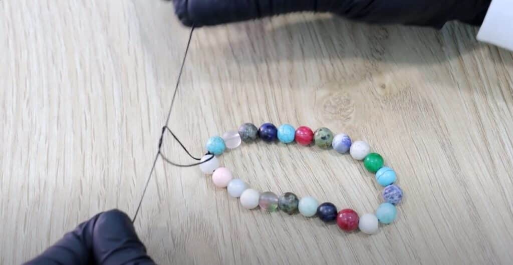 How To Make An Elastic Bracelet 17
